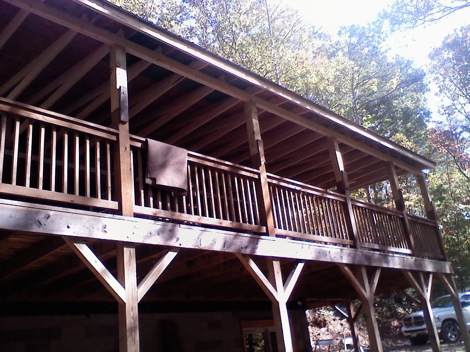 Timber framing under a new elevated porch and deck — Roof Leak Repair in Homestead by Roofing Brothers